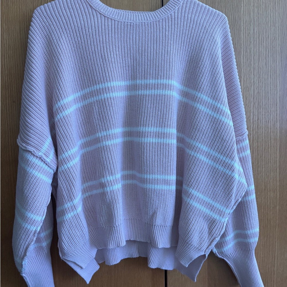 soft baby blush pink oversized sweater with white stripes